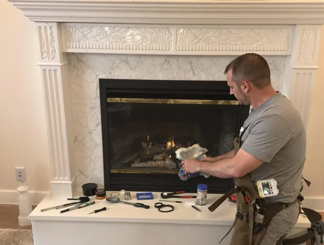 Brunswick Chimney Sweep performing fireplace maintenance in Brunswick, OH